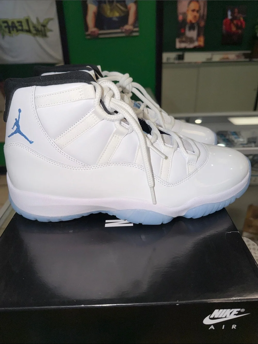 Jordan 11 Legend Blues Sneakers in White with Light Blue Accents